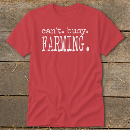 Red t-shirt with white text that reads "can't. busy. FARMING."