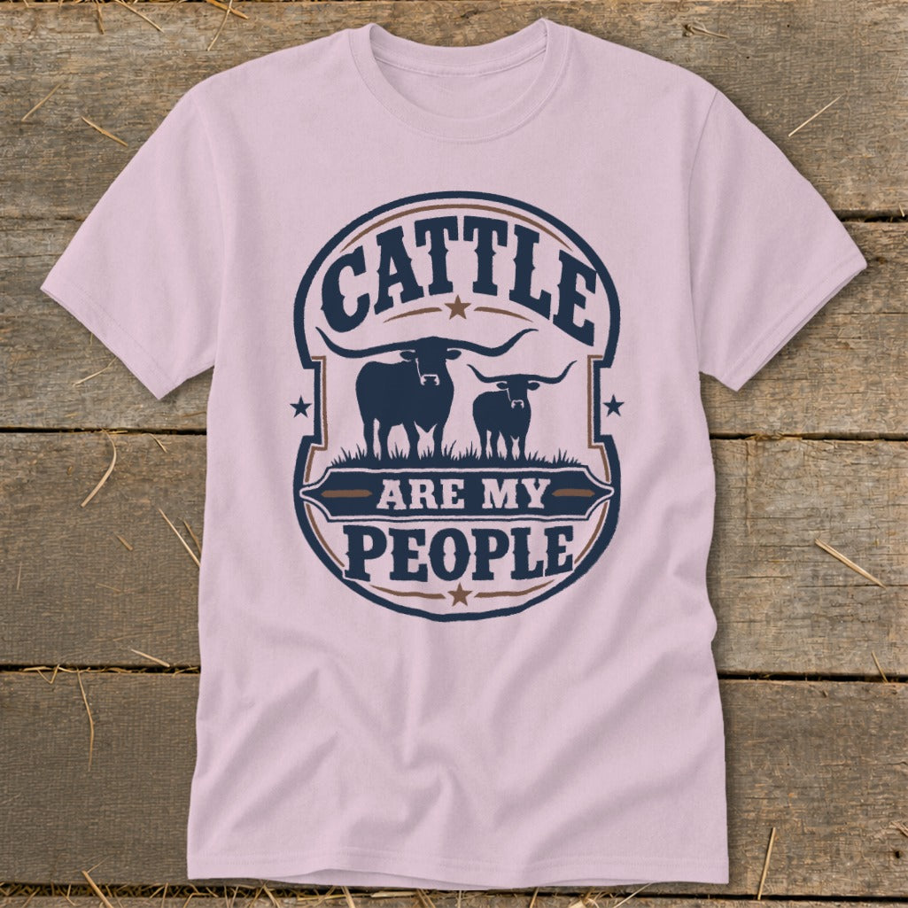 Light pink t-shirt with "Cattle are my people" and two longhorn cattle graphic.