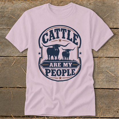 Light pink t-shirt with "Cattle are my people" and two longhorn cattle graphic.
