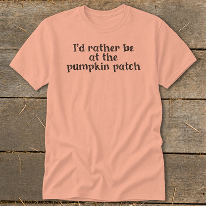Peach t-shirt with black text reading "I'd rather be at the pumpkin patch."
