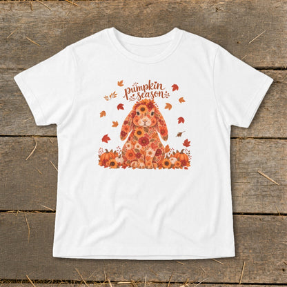 White t-shirt with a floral bunny, pumpkins, and "pumpkin season" text.