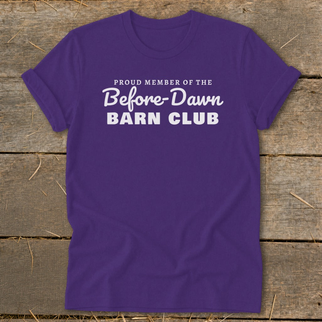 Purple t-shirt with white text reading "Proud Member of the Before-Dawn Barn Club".