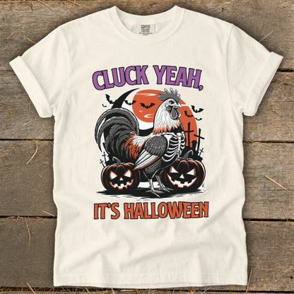 Rooster skeleton graphic with pumpkins and text "Cluck Yeah, It's Halloween".