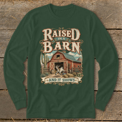 Long sleeve shirt with "Raised in a Barn And It Shows" text and barn graphic.