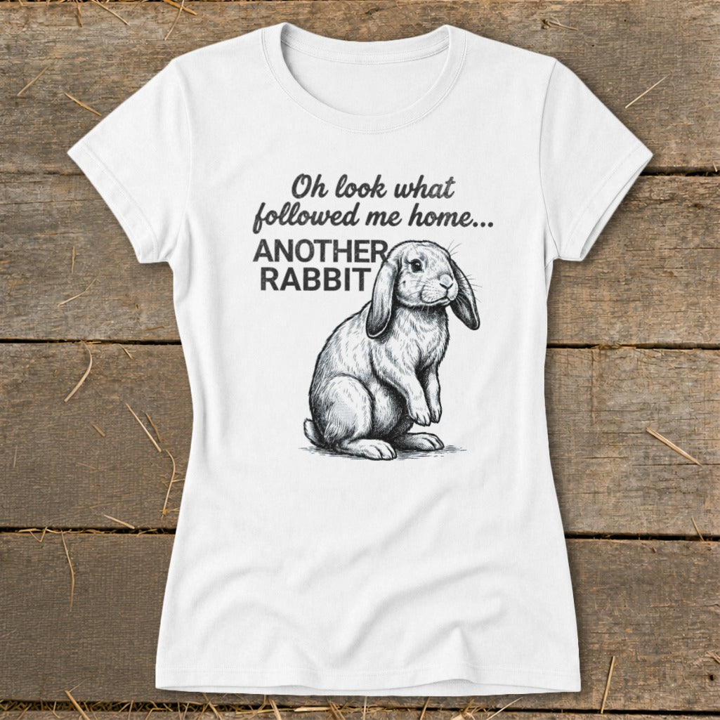 White t-shirt with drawing of a lop-eared rabbit and text "Oh look what followed me home... ANOTHER RABBIT".