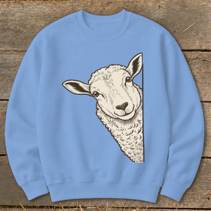 Light blue sweatshirt with a drawing of a sheep peeking from the side.