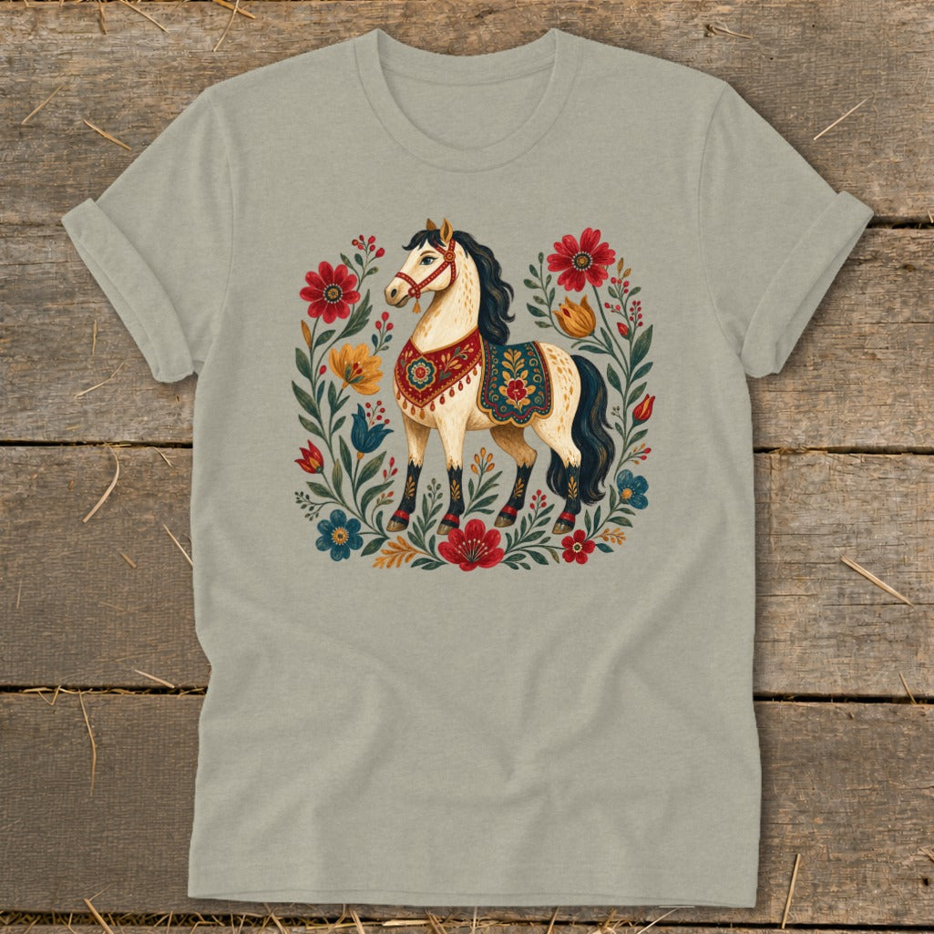 Cream t-shirt with a folk art horse surrounded by colorful flowers.