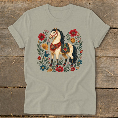 Cream t-shirt with a folk art horse surrounded by colorful flowers.
