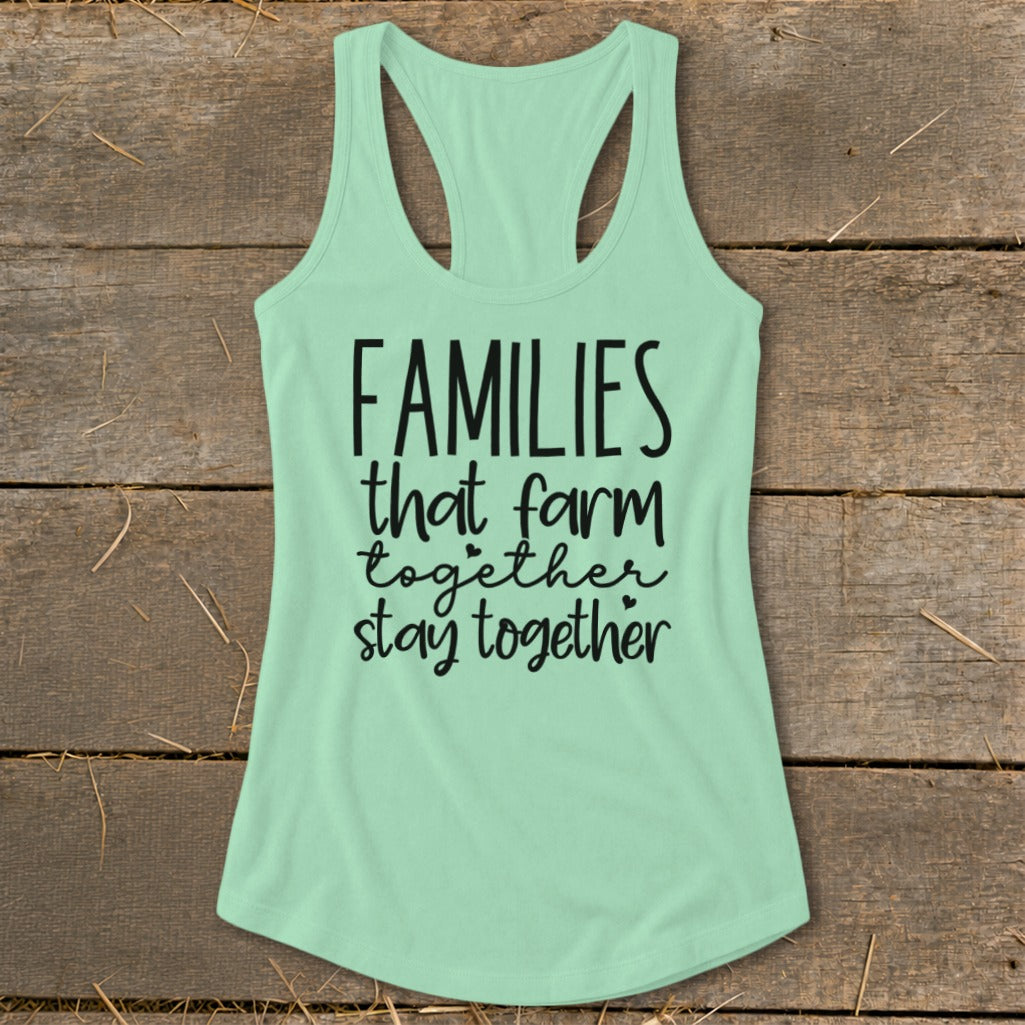 Mint green tank top with black text: "FAMILIES that farm together stay together."