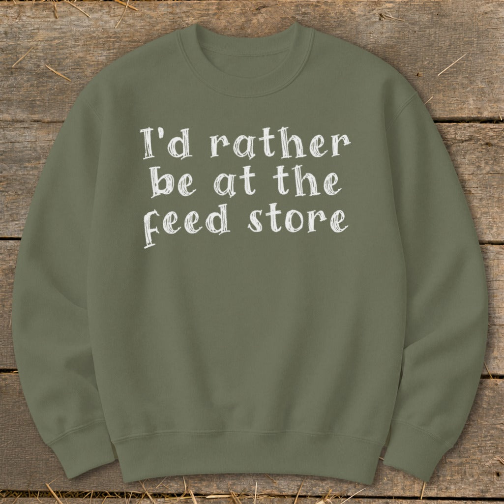 Olive green sweatshirt with white text "I'd rather be at the feed store."