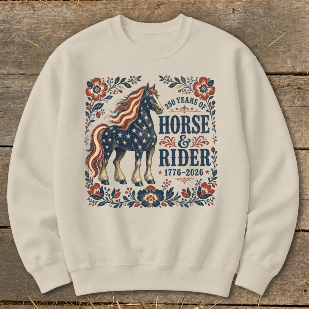 Cream sweatshirt with patriotic horse and text "250 Years of Horse & Rider 1776-2026".