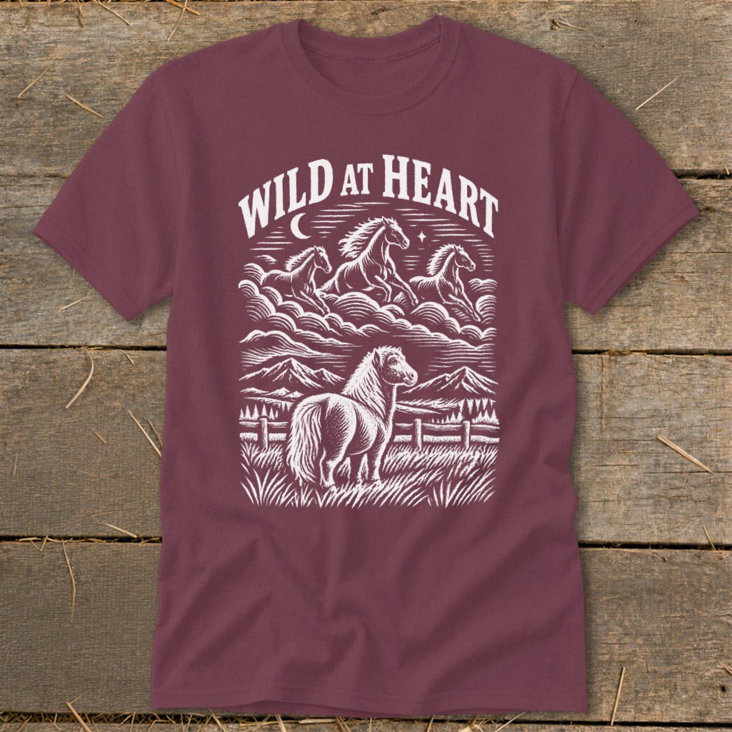 Maroon t-shirt with white illustration of horses and "Wild at Heart" text.