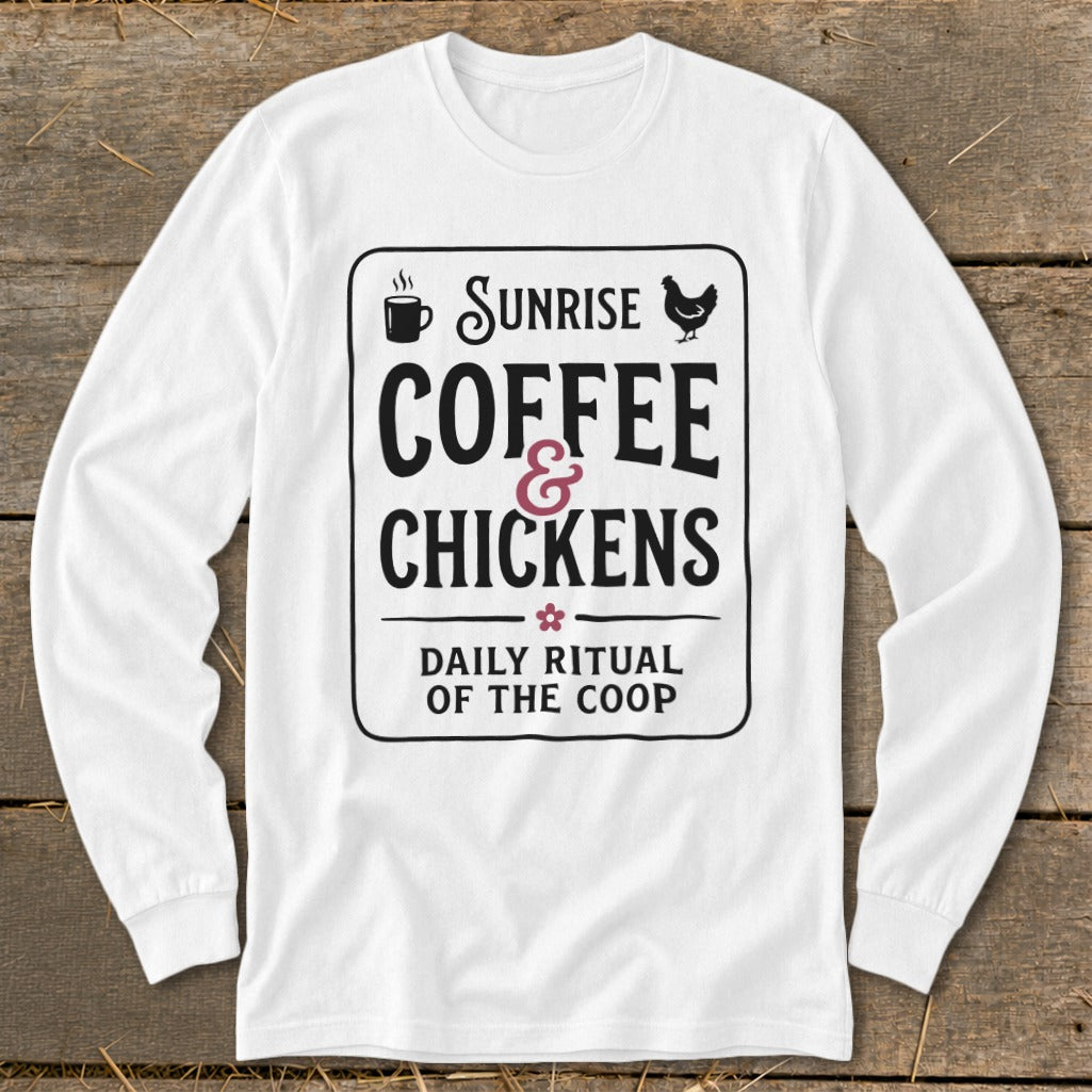 White long-sleeve shirt with black text: "Sunrise Coffee & Chickens Daily Ritual Of The Coop".