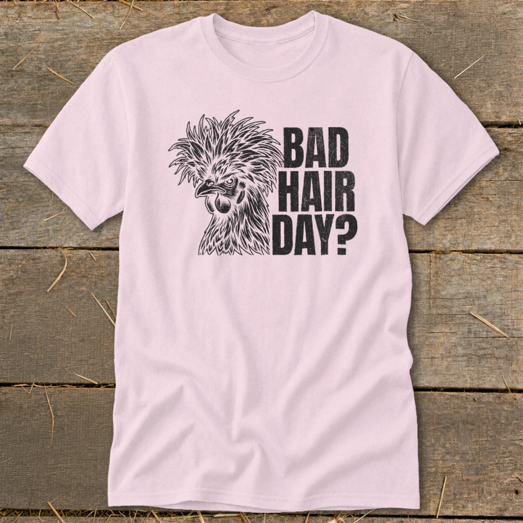 Pink t-shirt with a chicken graphic and text "BAD HAIR DAY?".