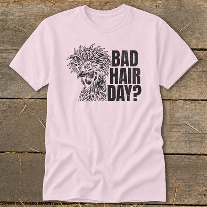 Pink t-shirt with a chicken graphic and text "BAD HAIR DAY?".