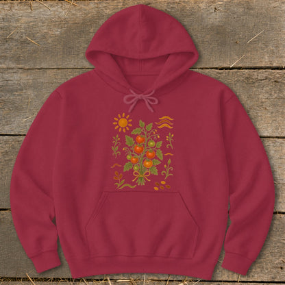 Maroon hoodie with a central embroidered design of a tomato plant and sun.