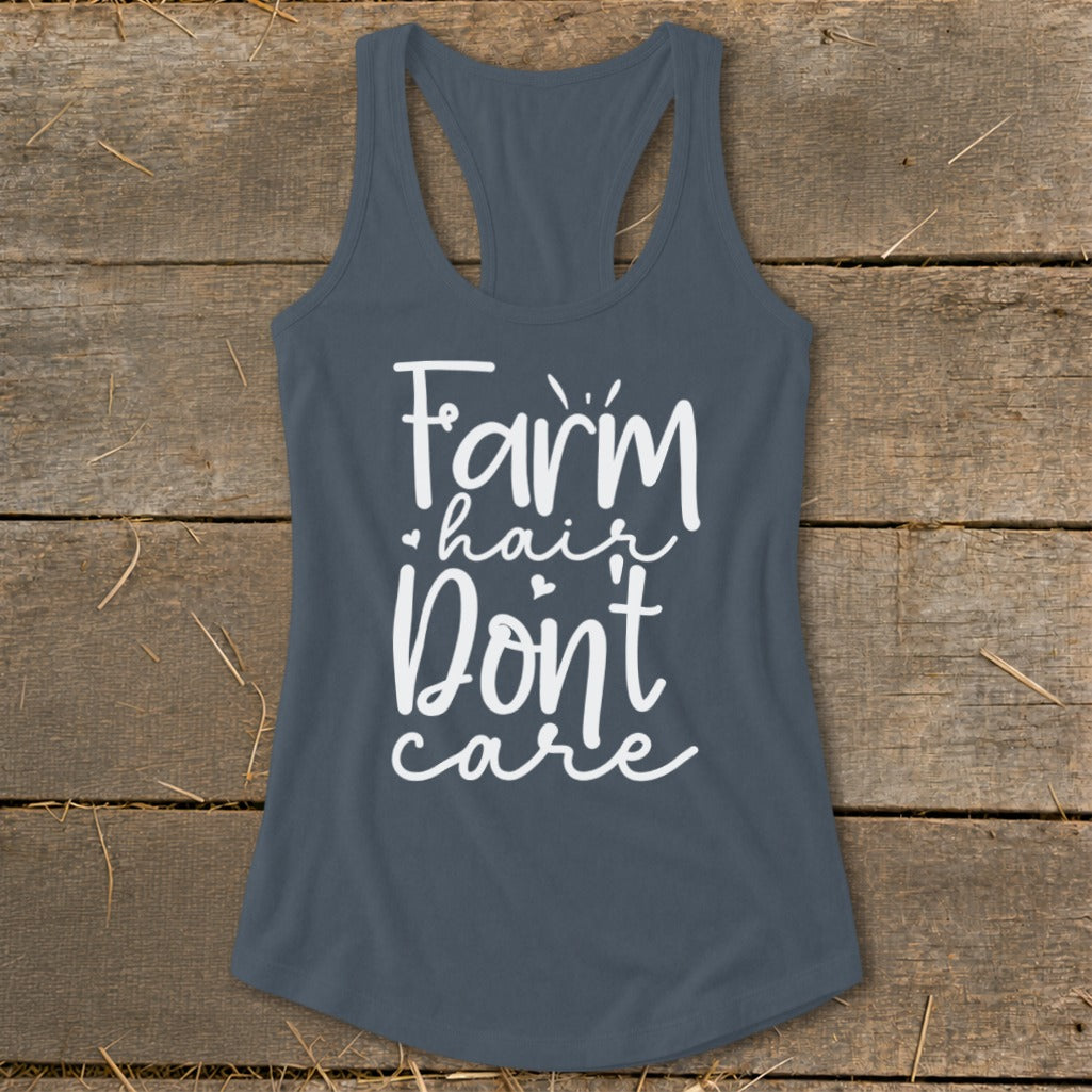 Gray racerback tank top with white text "Farm hair Don't care".