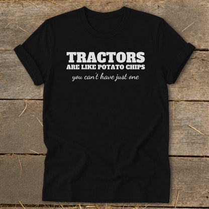 Black t-shirt with white text reading "Tractors are like potato chips you can't have just one."