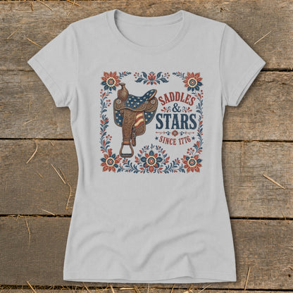 Grey t-shirt with vintage saddle graphic and "Saddles & Stars Since 1776" text.