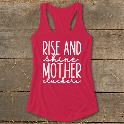 Crimson tank top with white text "Rise and shine mother cluckers".