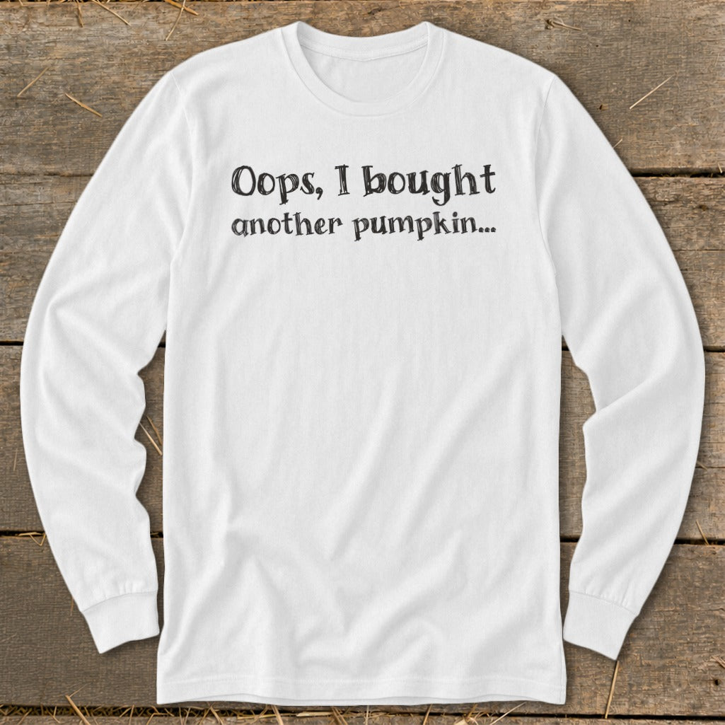 White long-sleeve shirt with black text reading "Oops, I bought another pumpkin..."