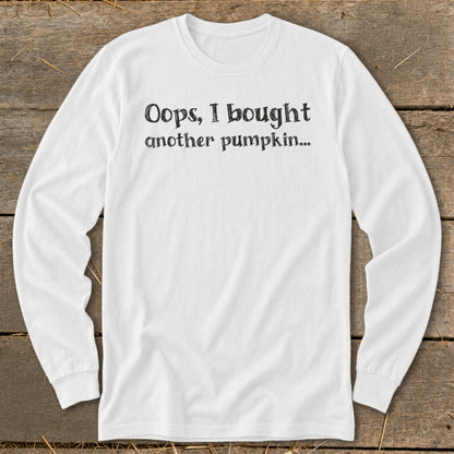 White long-sleeve shirt with black text reading "Oops, I bought another pumpkin..."