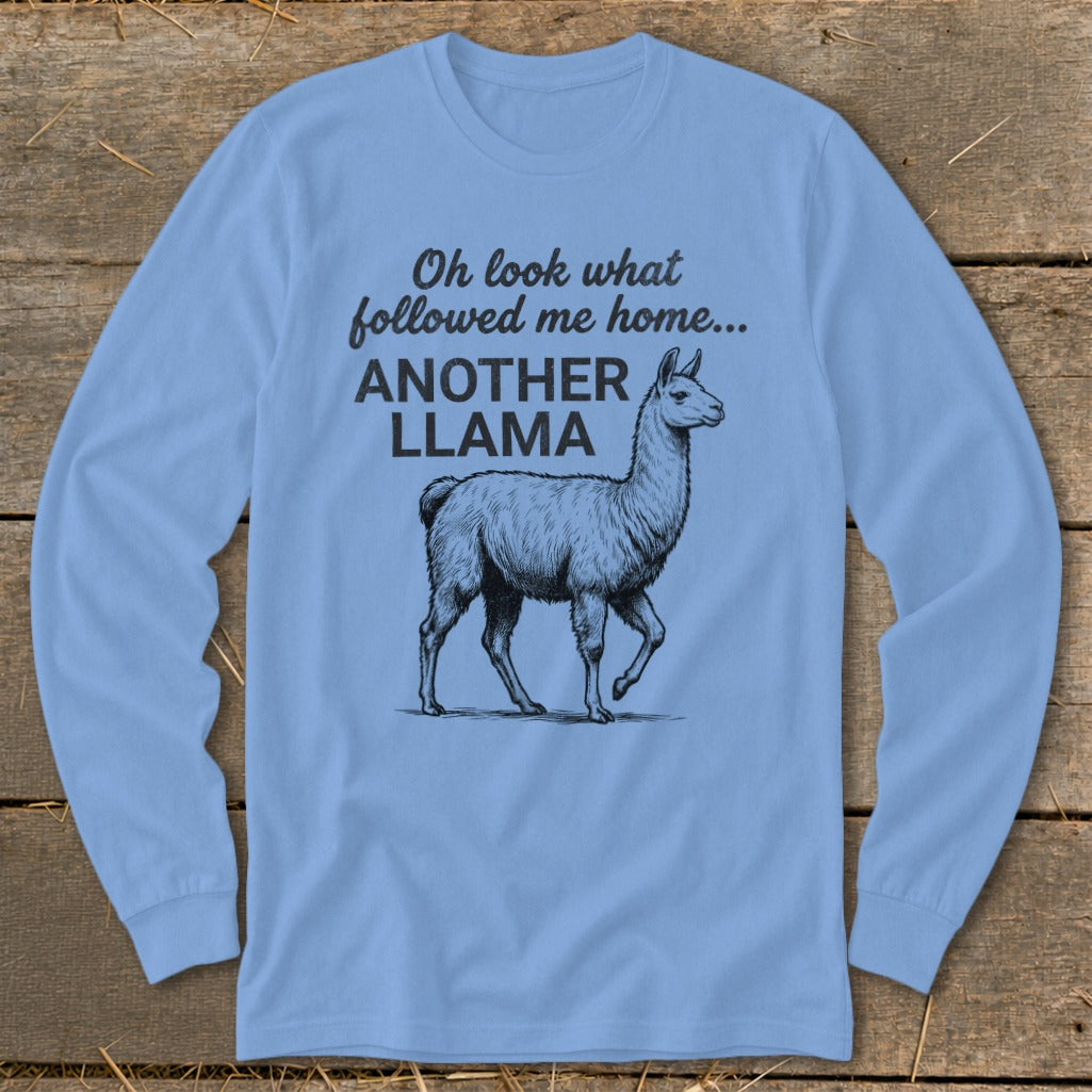 Light blue long-sleeve shirt with llama graphic and text "Oh look what followed me home... ANOTHER LLAMA".