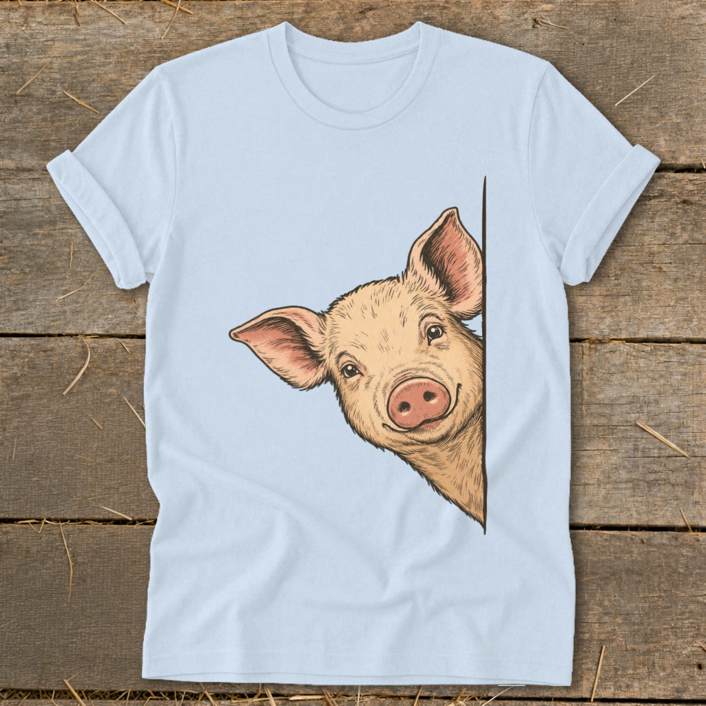 Light blue t-shirt with a smiling cartoon pig peeking around the side.