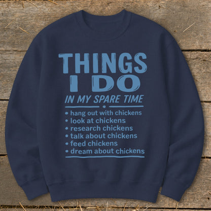 Navy sweatshirt with "Things I Do In My Spare Time" and chicken-related activities.