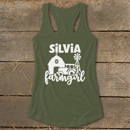 Olive green tank top with white "SILVIA farmgirl" graphic featuring a barn, tractor, and windmill.