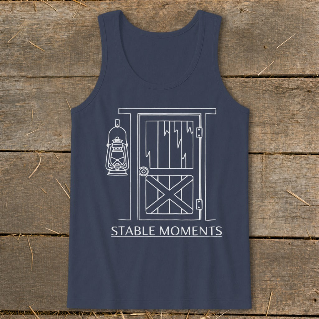 Navy tank top with white line art of a barn door and lantern, text "STABLE MOMENTS".