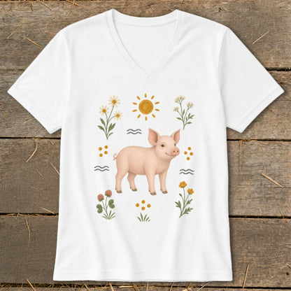 White v-neck t-shirt with a watercolor illustration of a pig, sun, and flowers.