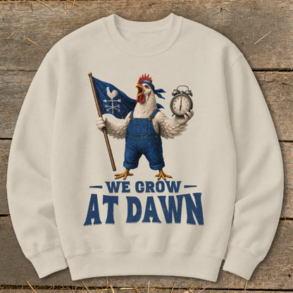 Chicken wearing overalls holds flag and alarm clock, text reads "WE GROW AT DAWN".