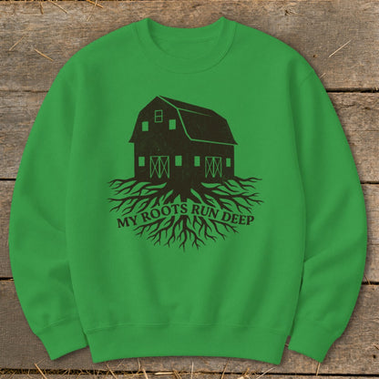 Green sweatshirt with barn and roots graphic reading "MY ROOTS RUN DEEP."