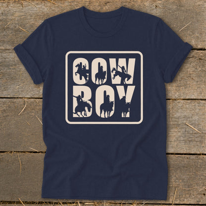Navy t-shirt with "COW BOY" text and cowboy silhouettes in a rounded rectangle.