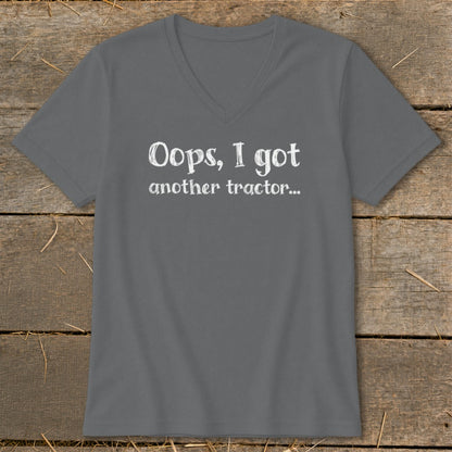 Gray v-neck t-shirt with white text reading "Oops, I got another tractor..."