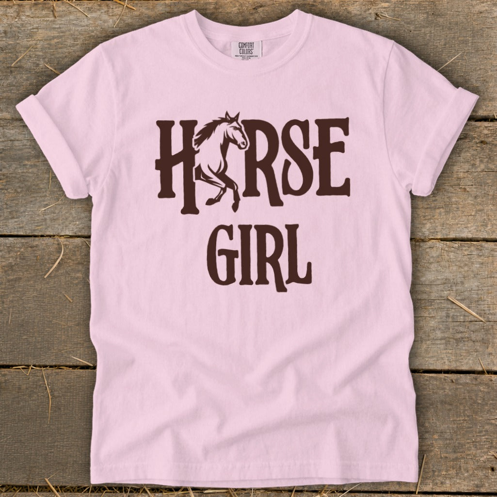 Pink t-shirt with "Horse Girl" text and horse graphic.
