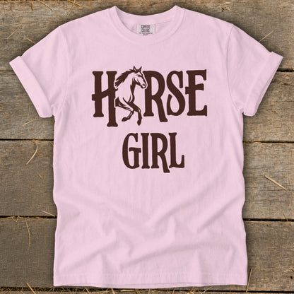 Pink t-shirt with "Horse Girl" text and horse graphic.