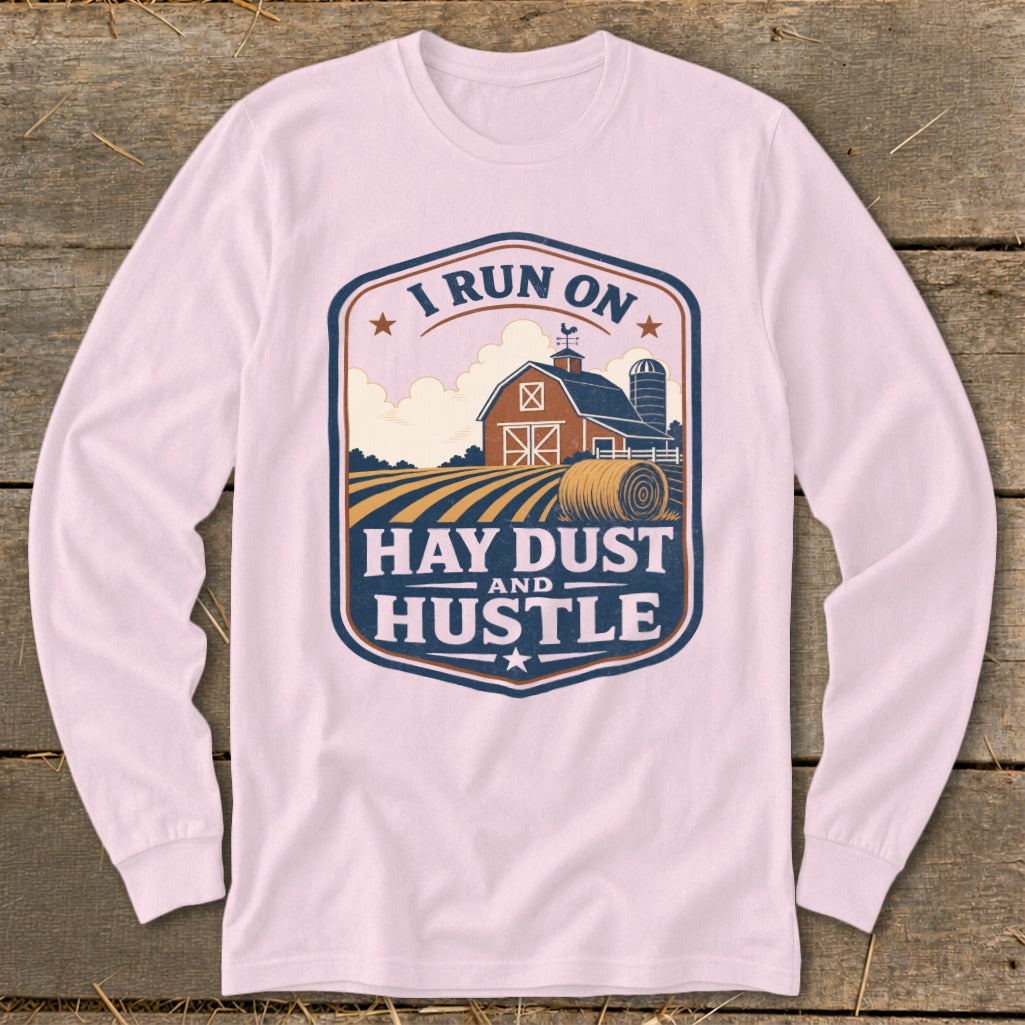 Long-sleeve shirt with "I RUN ON HAY DUST AND HUSTLE" farm graphic.
