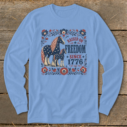 Light blue long sleeve shirt with American flag-themed horses and patriotic text.