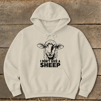 Cream hoodie with a black sheep graphic and text "I DON'T GIVE A SHEEP".
