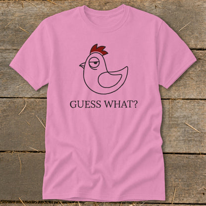 Pink t-shirt with a cartoon chicken and the text "GUESS WHAT?".