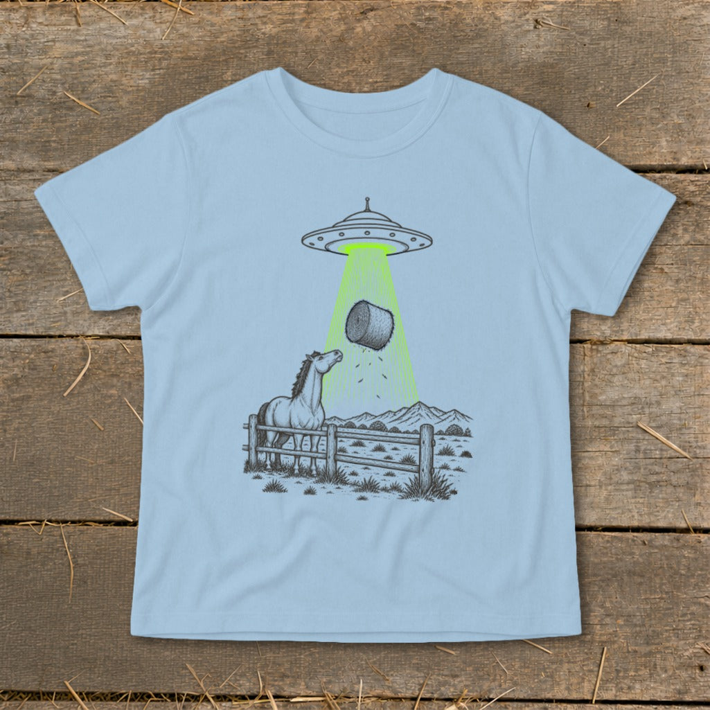 Horse and hay bale being beamed up by a UFO.