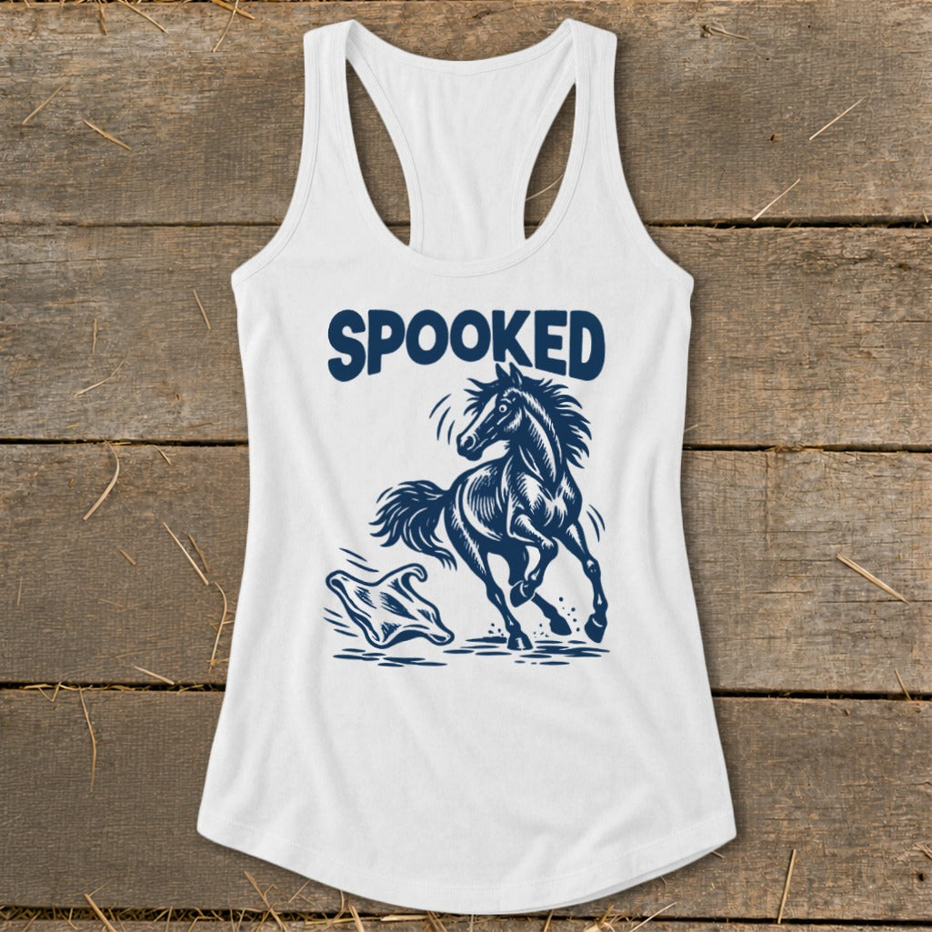 White tank top with navy blue graphic of a running horse and the word "SPOOKED".