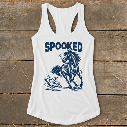 White tank top with navy blue graphic of a running horse and the word "SPOOKED".