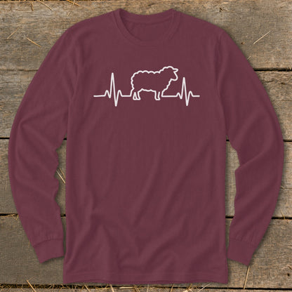 Maroon long-sleeve t-shirt featuring a white graphic of a sheep integrated into a heartbeat line.