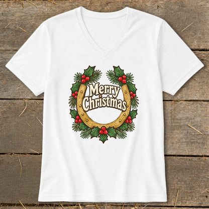 White v-neck t-shirt with "Merry Christmas" text on a horseshoe and holly wreath graphic.