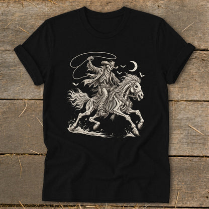 Black t-shirt with skeleton cowboy on horse, lasso, moon, and bats graphic.