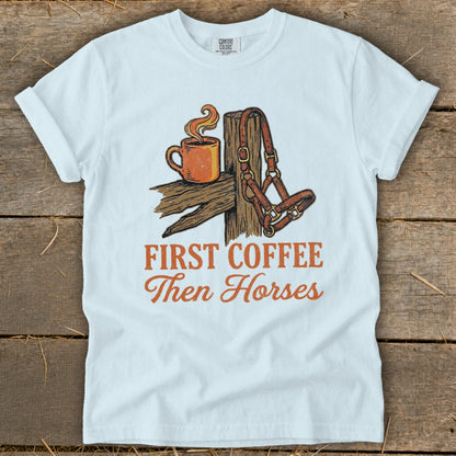White t-shirt with "First Coffee Then Horses" text and horse halter image.