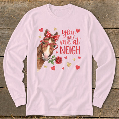 Pink long-sleeve shirt with horse graphic and text "you had me at neigh".